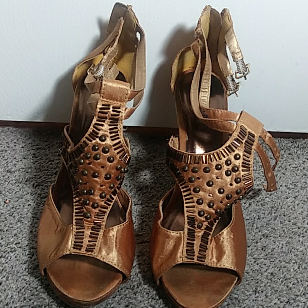 Gold and brown shoes